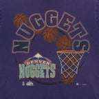 Close-up of the faded Denver Nuggets basketball-and-hoop front graphic