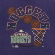Close-up of the faded Denver Nuggets basketball-and-hoop front graphic
