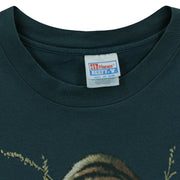 Close-up of the Hanes Beefy-T neck label showing size XXL inside the green 1990s T-shirt.