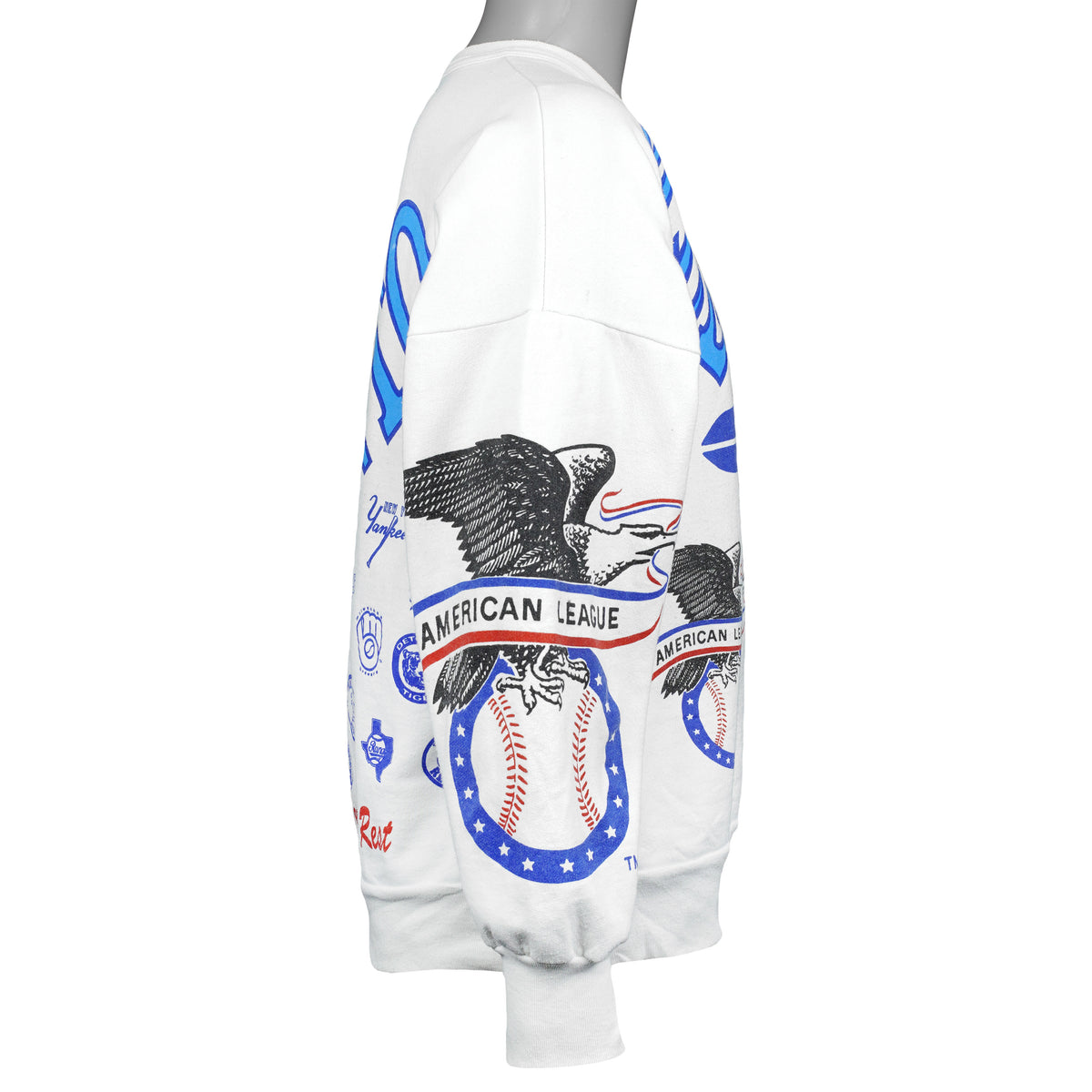 Left-side view of the white Blue Jays sweatshirt showing the all-over team print across the sleeve and body.