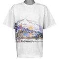 Front view of white speckled T-shirt with Kona Hawaii mountains, ocean, island, and sun scene.