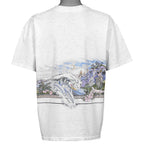 Back view of the Kona Hawaii shirt with a dolphin, ocean wave, moon, and mountain scenery.