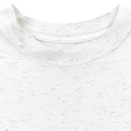 Close view of the white flecked crew neck showing no readable garment label attached.