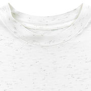 Close view of the white flecked crew neck showing no readable garment label attached.