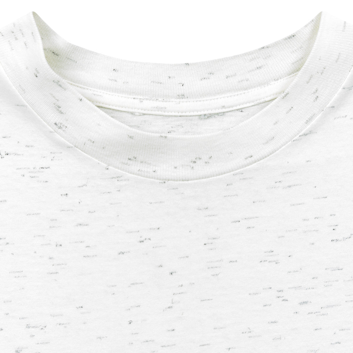 Close view of the white flecked crew neck showing no readable garment label attached.