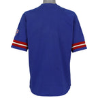 Plain blue back of the Texas Rangers T-shirt with red and white sleeve trim