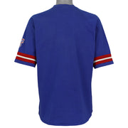 Plain blue back of the Texas Rangers T-shirt with red and white sleeve trim