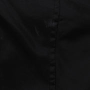 Close view of a small worn area beside a seam on the black White Sox jacket