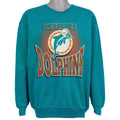 Teal Miami Dolphins graphic NFL sweatshirt front showing the complete garment and main artwork from the 1990s