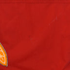 Mark on the red sleeve fabric beside the Blackhawks patch edge