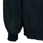 Close-up of visible marks on the Chicago Bears jacket sleeve.