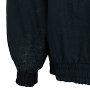 Close-up of visible marks on the Chicago Bears jacket sleeve.