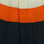 Close-up of marks and repaired wear on the jacket front.