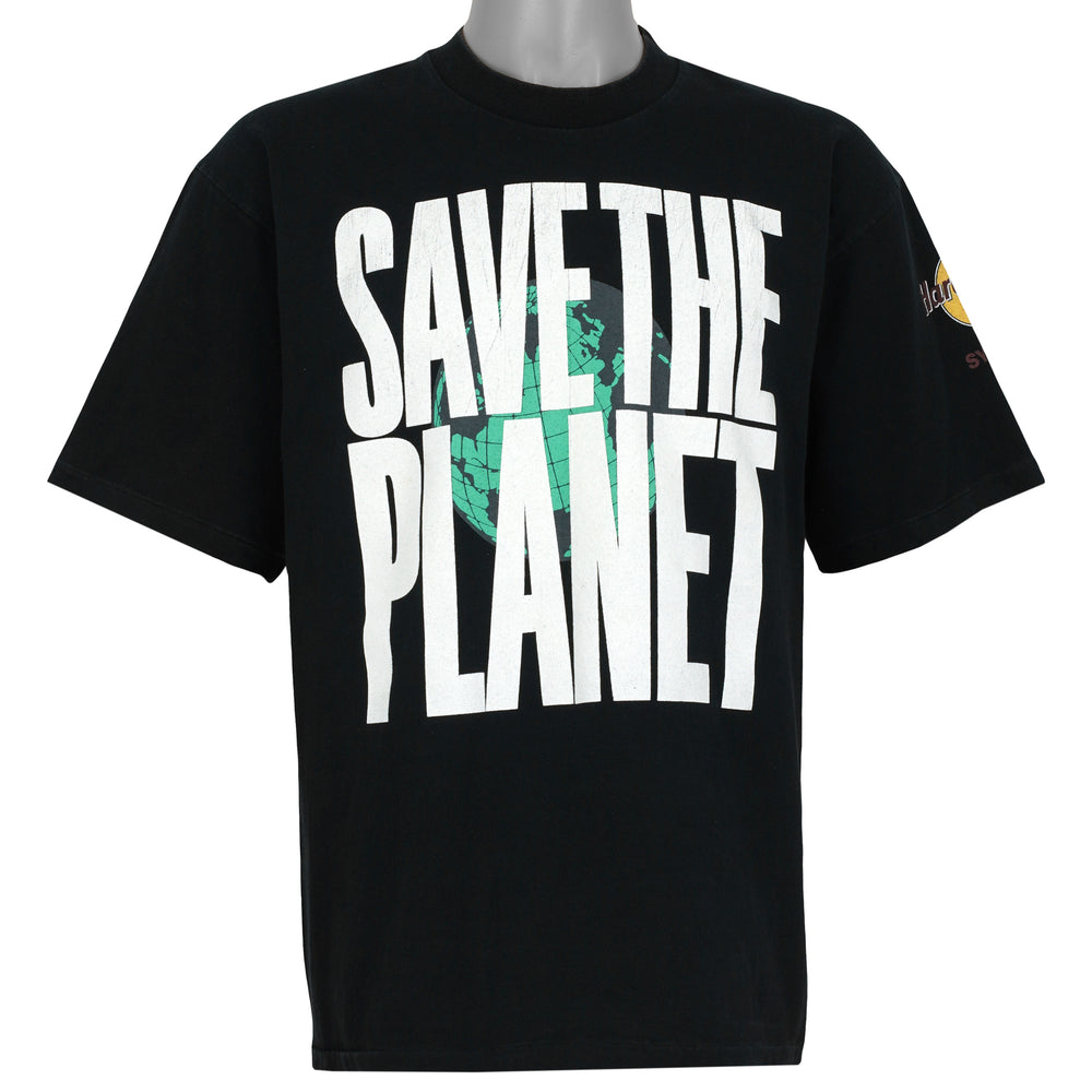 Black T-shirt front with large Hard Rock Cafe Save the Planet graphic from the 1990s