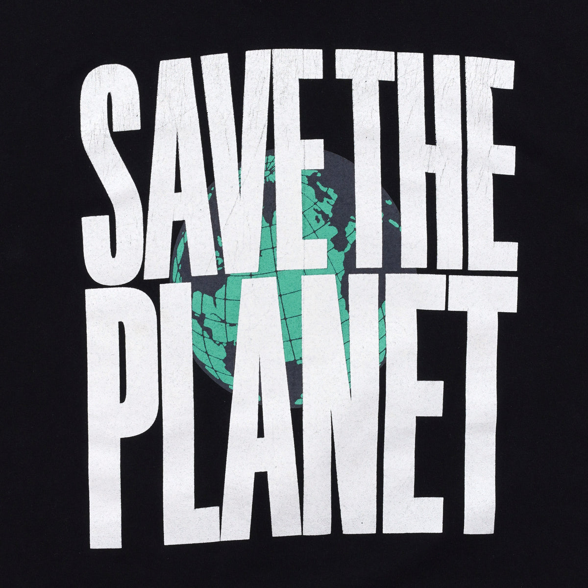 Close-up of the worn Save the Planet artwork on the black shirt