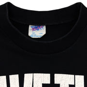 Ricky Large Made in Australia label inside the black graphic T-shirt