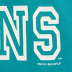 Close-up of the Miami Dolphins print and 1995 NFL copyright text