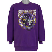 Purple Baltimore Ravens NFL sweatshirt front with central division helmet graphic by Pro Player, dated 1996