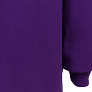 Close-up of a faded area on the purple sweatshirt sleeve