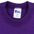 Close-up of the Pro Player XXL label inside the purple Ravens sweatshirt
