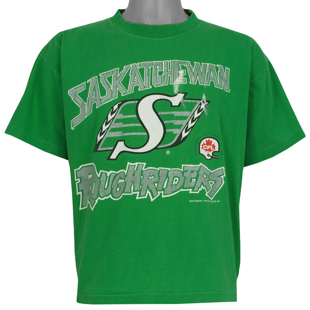 Green Saskatchewan Roughriders T-shirt front with oversized CFL team logo graphic, dated 1992