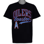 Black Houston Oilers NFL T-shirt front with red and blue script logo by Hanes from the 1990s