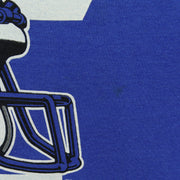 Detail of a minor mark beside the faded helmet print on blue fabric
