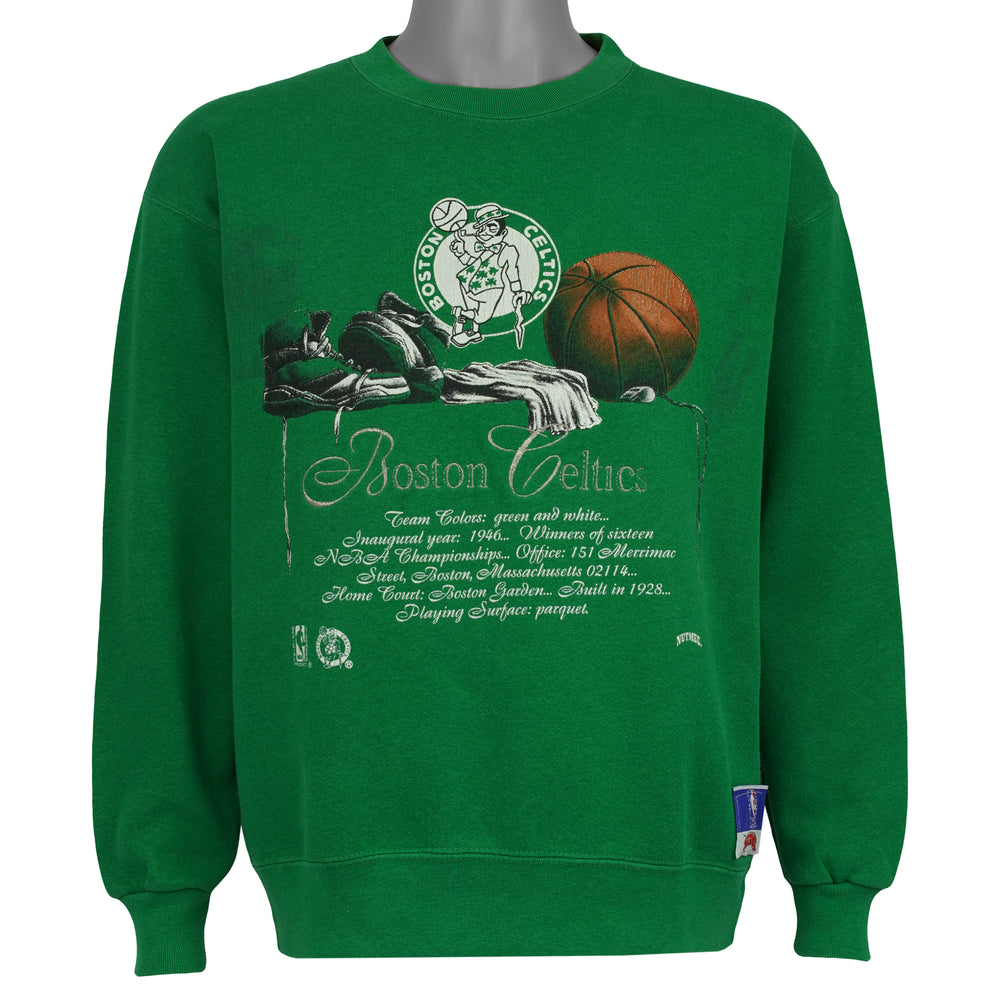 Green Boston Celtics NBA sweatshirt front with basketball equipment graphic by Nutmeg from the 1990s
