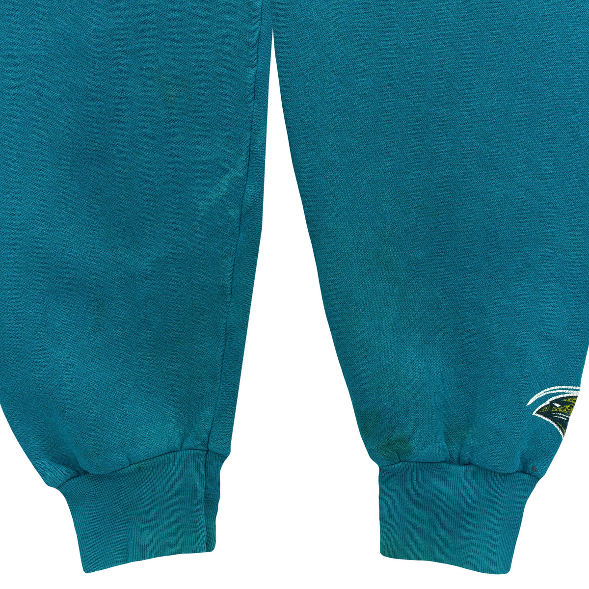 Teal sweatshirt sleeves showing marks and a Jaguars cuff logo