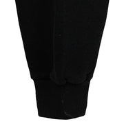 Close view of a minor mark near the black sweatshirt cuff