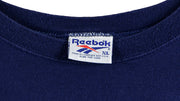 Reebok - Blue Big Spell-Out T-Shirt 1990s X-Large Vintage Retro