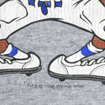 Looney Tunes - Taz Defense Spell-Out T-Shirt 1996 Medium Vintage Retro Football