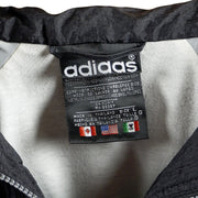 Adidas - Black Stripe Tape Logo Windbreaker 1990s Large Vintage Retro