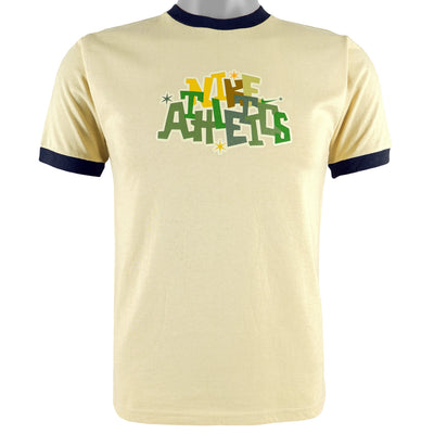 Nike - Beige Nike Athletics Spell-Out T-Shirt 1990s Medium