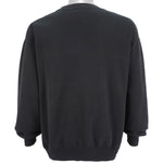 NFL (Hanes) - Oakland Raiders Big Logo Crew Neck Sweatshirt 1990s X-Large Vintage Retro