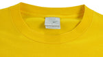 Nike - Yellow Spell-Out T-Shirt 1990s Large Vintage Retro