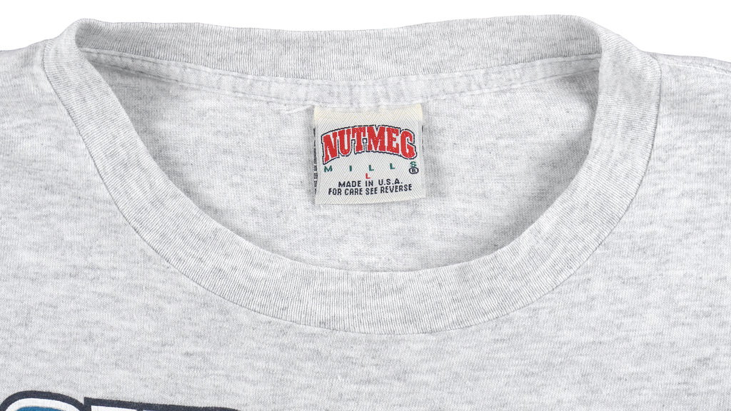 NFL (Nutmeg) - Jacksonville Jaguars Big Spell-Out T-Shirt 1990s Large Vintage Retro Football