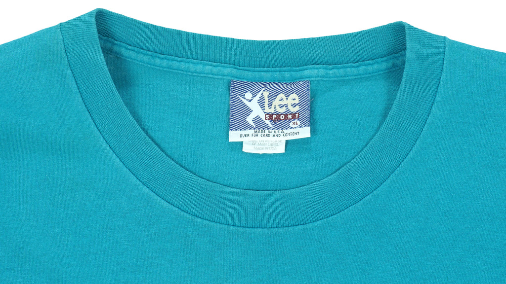 NBA (Lee) - Green Charlotte Hornets T-Shirt 1990s X-Large Vintage Retro Basketball