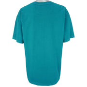 NBA (Nutmeg) - Charlotte Hornets Blue T-Shirt 1990s X-Large Vintage Retro Basketball