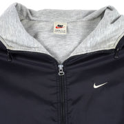 Nike - Black Spell-Out Hooded Windbreaker 1990s Large Vintage Retro