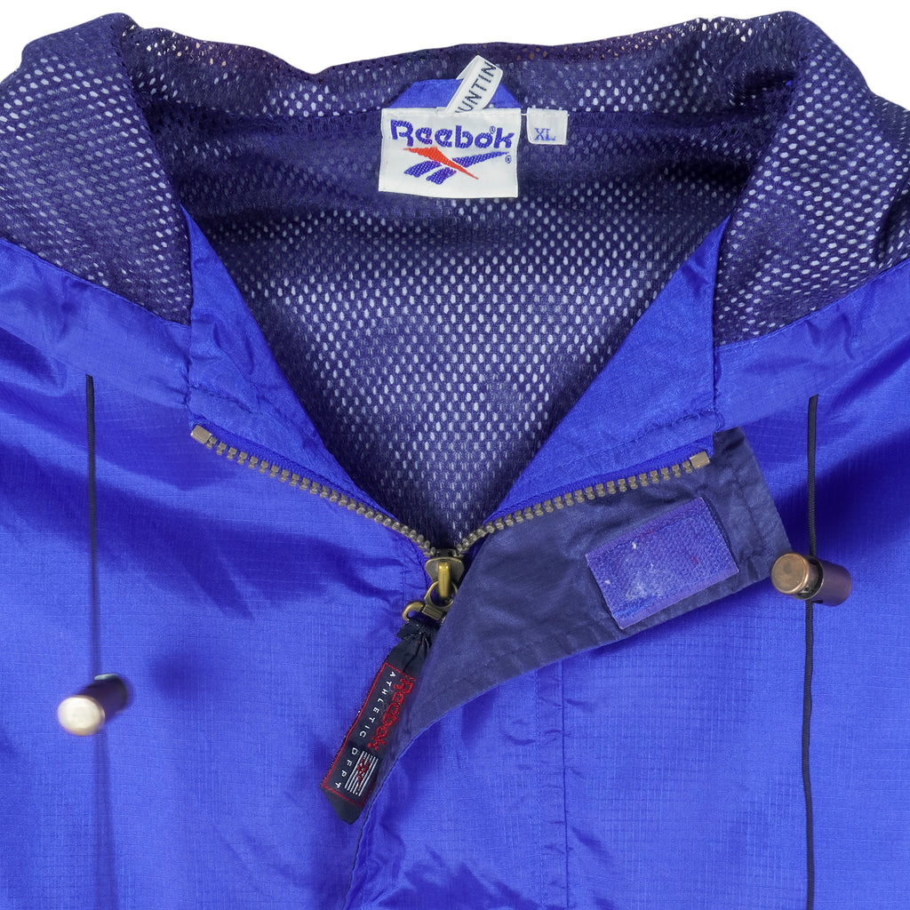 Reebok - Blue Hooded Windbreaker 1990s X-Large Vintage Retro