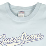 Guess - Blue Spell-Out T-Shirt 1990s Large Vintag Retro