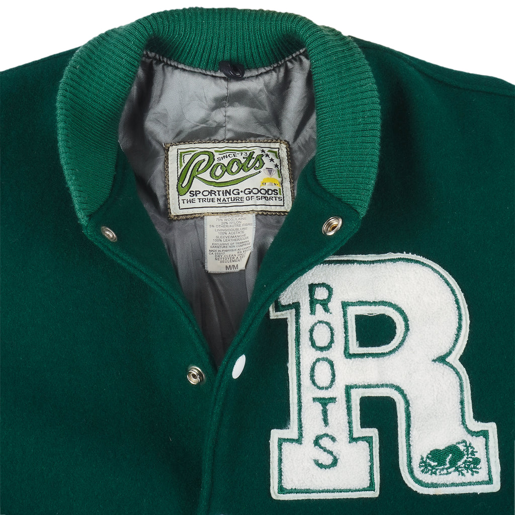 Vintage (Roots Canada) - Green and White Spell-Out Varsity Jacket 1990s Medium Vintage Retro