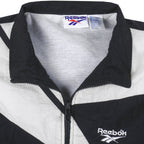 Reebok - Black Kamikaze Embroidered Windbreaker 1990s Large Vintage Retro