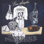 NFL (Nutmeg) - Los Angeles Raiders Locker Room T-Shirt 1990s X-Large Vintage Retro Football