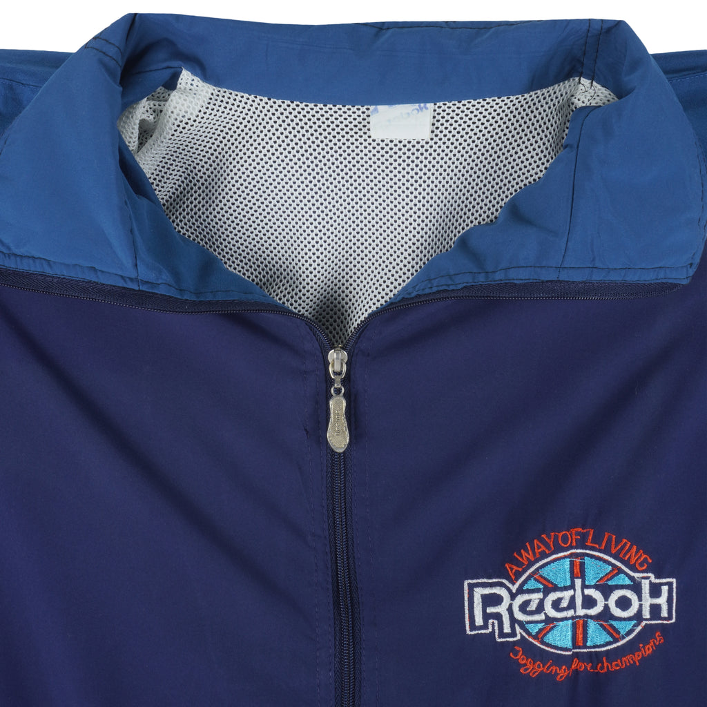 Reebok - Blue Big Logo Windbreaker 1990s X-Large Vintage Retro