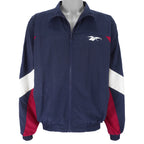 Reebok - Blue Embroidered Big Logo Windbreaker 1990s Medium Vintage Retro