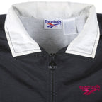 Reebok - Zip-Up Windbreaker 1990s Medium Vintage Retro