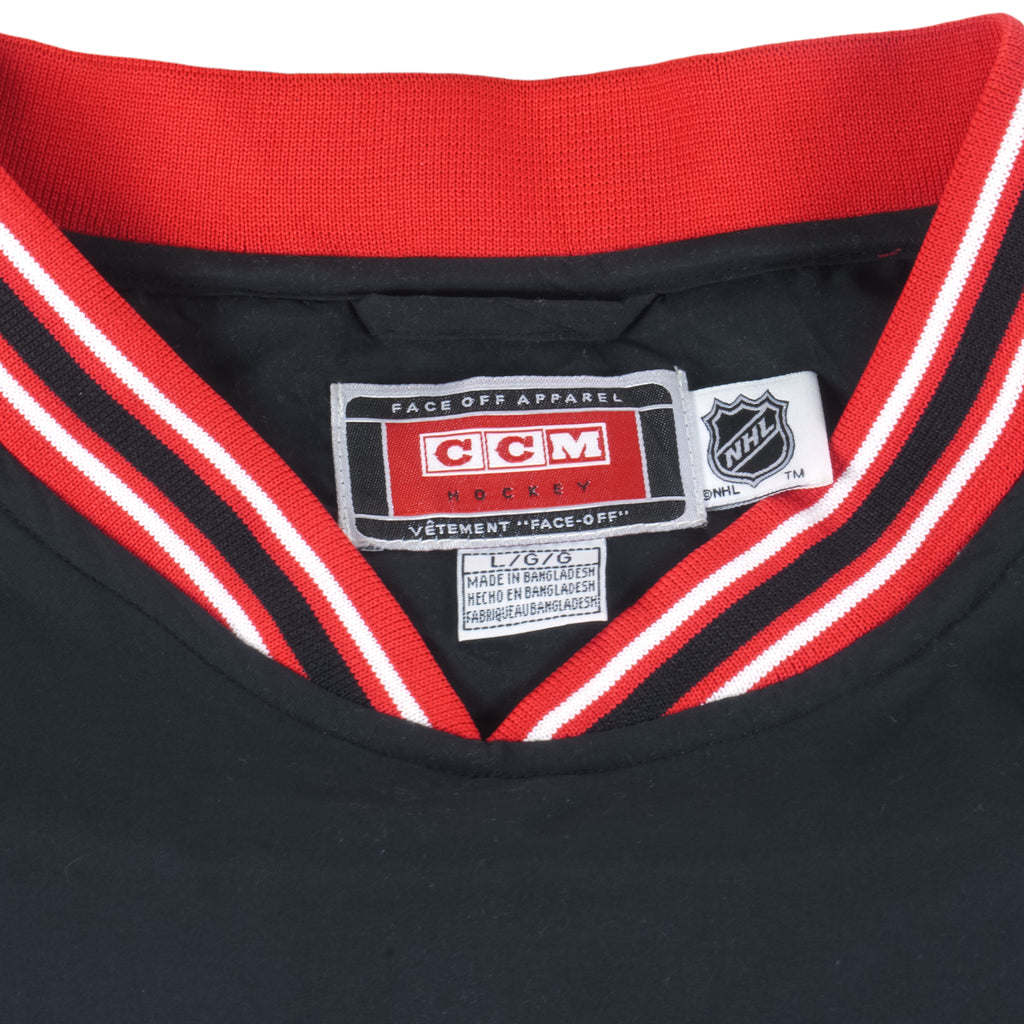 NHL (CCM) - Carolina Hurricanes Face Off Apparel Pullover 1990s Large Vintage Retro Embroidered Spell-Out