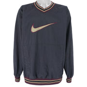 Nike  - Big Embroidered Logo Pullover Windbreaker 1990s X-Large Vintage Retro